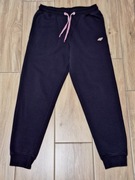 Ciepłe spodnie dresowe granatowe 4F r.152