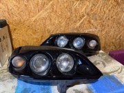 Lampy przód projektory Hella Astra G