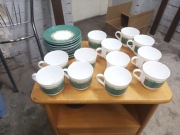 Serwis kawowy 12 filiżanek 10 talerzyków 