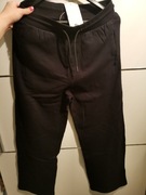 Nowa spodnie dresowe 170 czarne z kieszeniami na zamek 