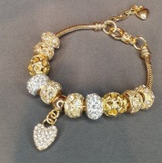 Piękna bransoletka w kolorze złota 