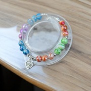 Kolorowa bransoletka z zawieszką serca – ręcznie robiona