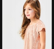 Cekinowa sukienka Reserved 104 złota tiulowa