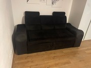 Sofa czarna rozkładana +2 pufy