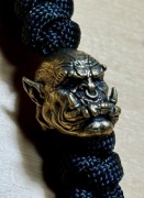 Zawieszka do noża EDC kluczy z mosiężnym koralikiem : OGR z kłami 