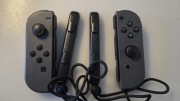 Zestaw 2 oryginalnych kontrolerów Joy-Con Nintendo Switch + uchywty