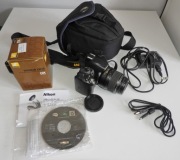 Lustrzanka Nikon D3000 korpus + obiektyw .Przebieg: 1687