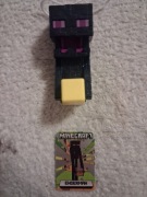 Figurka kolekcjonerska przedstawiająca Endermana z gry Minecraft.