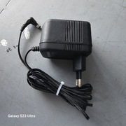 Zasilacz DC AMIGO AM-091000AV 9V 1A wtyk gruby bolec 5.0x3.0mm sprawny opis