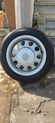 Felgi stalowe z oponami zimowymi 185/60/14 rozstaw śrub 4/100 orginal VW 