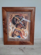 Portret ciemnoskórej kobiety w pięknej ramie