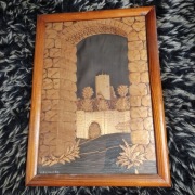 Obraz ze słomy przedstawiający zamek w Kazimierzu