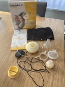 Laktator Medela Swing Flex + dodatki