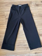 eleganckie czarne spodnie dla dziewczynki rozm 152 szeroka nogawka