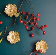 Uchwyt do mebli dziecięcych złoty; złota gałka meblowa w kształcie kwiatu