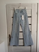 Dżinsy dzwony Blink Blink  w kolorze jasno niebieskim.