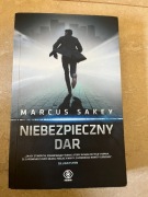 Marcus Sakey ,, Niebiezpieczy dar''