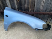 Błotnik prawy błękitny Volkswagen Passat B5