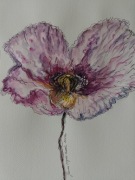 Akwarela z fioletowym kwiatem.