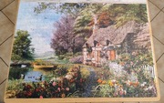 Puzzle ułożone 1000el 68x48cm wiejska chata RADOM