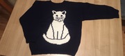 dziecięcy sweterek z siedzącym kotem