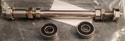 Oś piasty koła tylnego rowerowego z łożyskami fi 10mm, 180mm stalowa