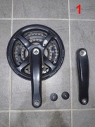 Mechanizmy korbowe i ramiona korb (Shimano, SR Suntour) – różne modele
