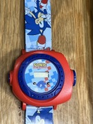 Zegarek Lexibook dla dziecka Elza lub Sonik Dis ey Froze