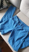 Niebieskie spodnie jeansy rurki slim fit Orsay 38