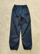 Spodnie przeciwdeszczowe Quechua na 10 - 11 lat roz. 140 - 146