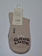 Beżowe skarpetki z wzorkami i napisem Good Luck
