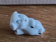 Leżąca świnka figurka ceramiczna
