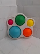 Simple Dimple, zabawka sensoryczna