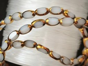 Szklane koraliki do tworzenia biżuterii Art 34, kolor szary że złotem