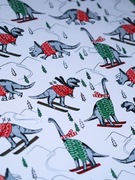 Papier do pakowania "Dinozaury na łyżwach", 101,6 cm x 2,40 m