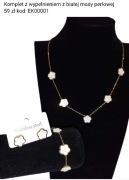 Komplet z wysokiej jakości stali z wypełnieniem z białej masy perłowej.