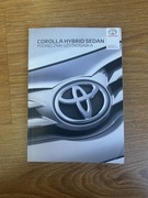 Podręcznik użytkownika Toyota Corolla Hybrid Sedan – oryginalna książka
