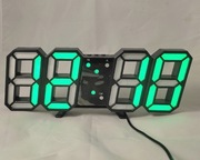 Duży zielony zegar cyfrowy.