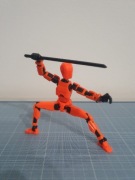 Figurka wojownik ruchoma wielostawowa 15 cm pomarańczowa bronie