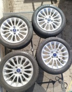 Opony z felgami do forda letnie .