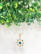 złoty naszyjnik z zawieszką w kształcie gwiazdy z niebieskim okiem proroka