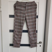 Reserved fajne materiałowe kolorowe spodnie w paski 158