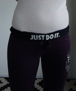 Nike XS skinny fioletowe z logo& odwijanym pasem