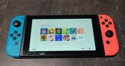 Nintendo SWITCH 4 pady + dwie gry