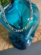 Bransoletka w kolorze srebrnym typu trzy na dwa