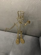 Figurka rzeźba z drutu metalowego z brokatem kolor złoty 40x22cm