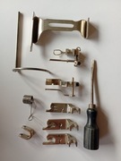 „Zestaw akcesoriów do maszyny do szycia – stopki + części – uniwersalne (89