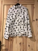 Biała koszula w słonie