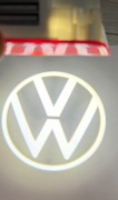 VW lampki drzwi logo