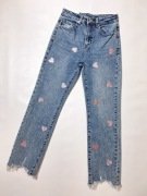 Spodnie jeansowe w serduszka 